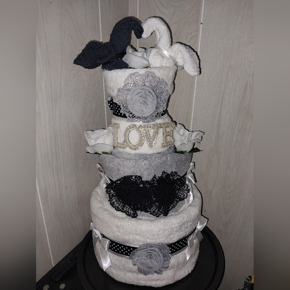 Chic Black and White Towel Cake with LOVE Accent